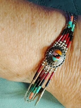 SOUTHWESTERN MULTI-PURPOSE BEADED, STERLING STRAND BRACELET. WITH CONCH ACCENT.